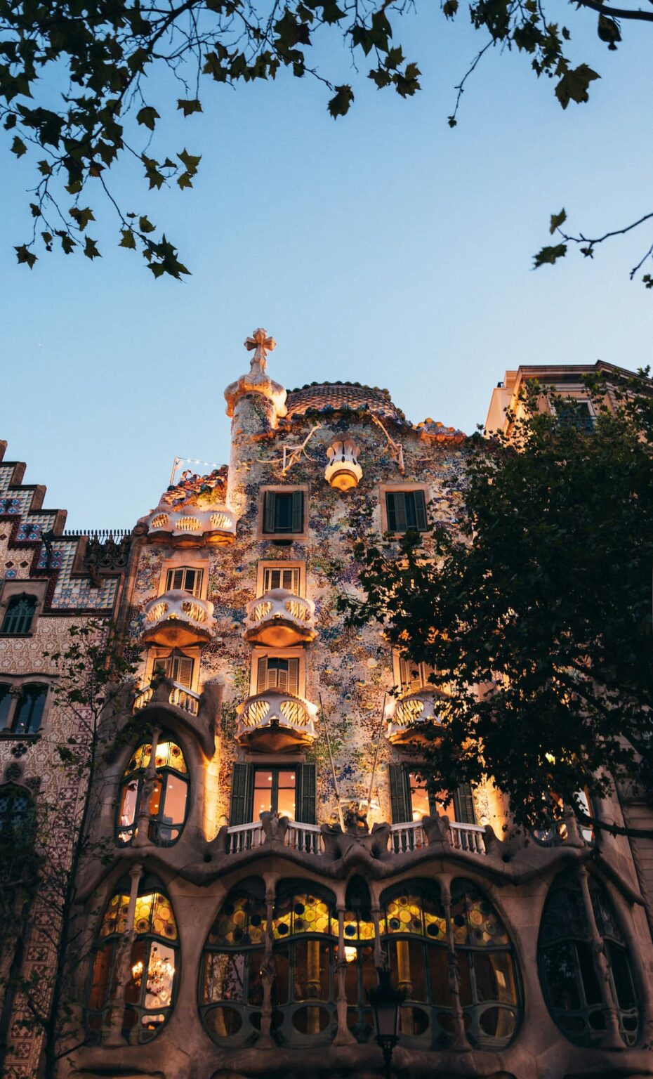 Iconic architecture in Barcelona at dusk, showcasing intricate details and vibrant colors.